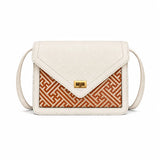Ivory Atelier handwoven bamboo leather bag by Bamboura, featuring ivory leather, woven bamboo panel and elegant luxury crossbody handbag design.