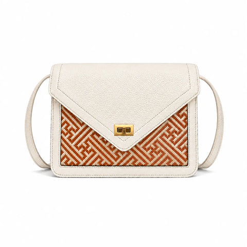 Ivory Atelier handwoven bamboo leather bag by Bamboura, featuring ivory leather, woven bamboo panel and elegant luxury crossbody handbag design.