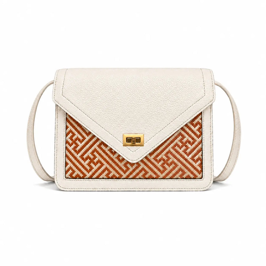 Ivory Atelier handwoven bamboo leather bag by Bamboura, featuring ivory leather, woven bamboo panel and elegant luxury crossbody handbag design.