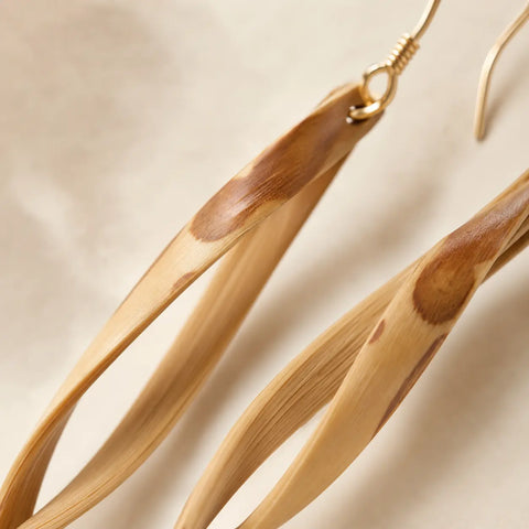 Close-up of fire-bent Fei bamboo detail on Wind Chimes earrings