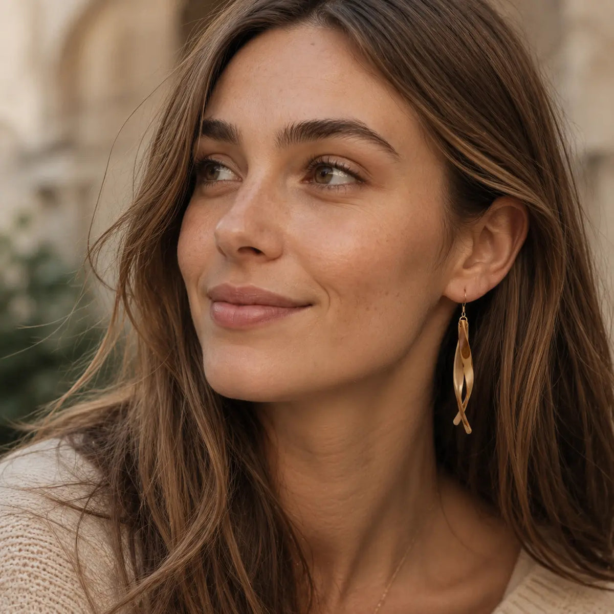 Wind Chimes bamboo earrings styled with cashmere and relaxed tailoring