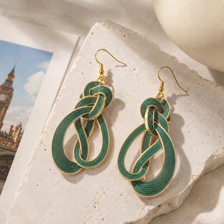 Handwoven teal bamboo loops on Tidal Bloom earrings