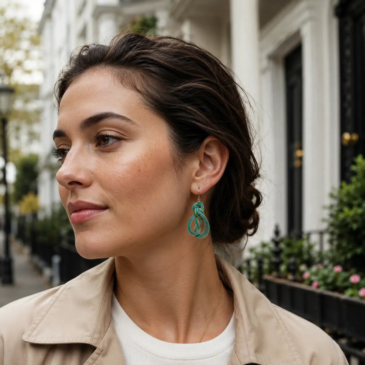 Tidal Bloom teal bamboo earrings styled with linen and soft tailoring