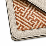 Detailed view of the handwoven bamboo panel on Bamboura Ivory Atelier handbag, highlighting traditional weaving techniques and natural bamboo texture.