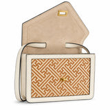 Ivory Atelier women's bamboo leather handbag opened to reveal the interior structure, showcasing handcrafted construction and functional luxury design.